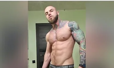 Bald Tattooed Jock Flex Muscles And Jerking
