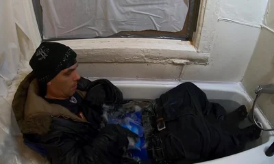 Skater rubbing the bulge in bathtube