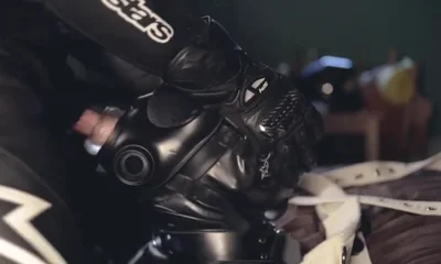Rubber boy sucking biker master cock